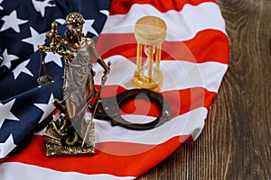 Law United States of America, statue of Lady Justice with United States of America Flag