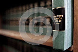 Lawbooks on Shelf for Study Legal Knowledge Social Security and Medicare