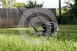 Lawn Mower in Backyard