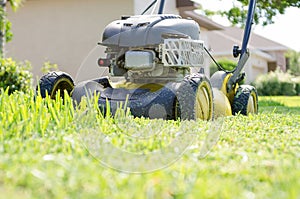 A Lawn Mower Cutting Grass