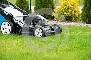 Lawn mower in the garden.