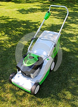 Lawn mower on the grass