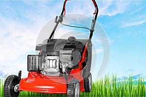 Lawn mower on a lawn, close-up view