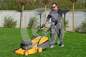 Lawn mower man working