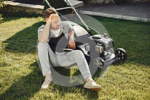 Lawn mower man working on the backyard