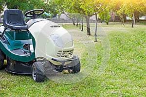 Lawn mower parked in a garden