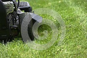 Lawn mowers on the field photo