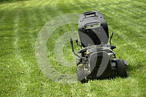 Lawn mowers on the field photo