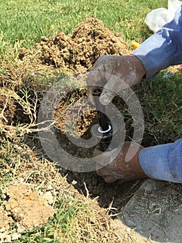 Lawn sprinkler fixing