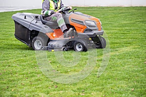 Lawn tractor mower in motion