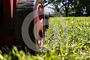 Lawnmover in the green field photo