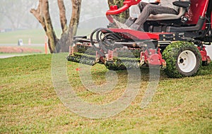 Lawnmower cutting grass , Second cut Lawnmower.