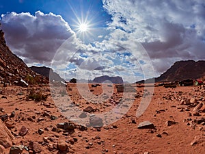 Lawrence Spring. Beautiful Scenery Scenic Panoramic View Red Sand Desert and Ancient Sandstone Mountains Landscape in Wadi Rum, Jo