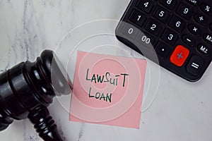 Lawsuit Loan write on sticky notes isolated on Wooden Table