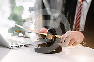 Lawyer business man working with paperwork on his desk in office.