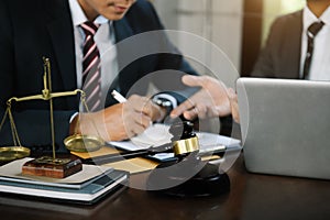 Lawyer business man working with paperwork on his desk in office workplace for consultant lawyer in office