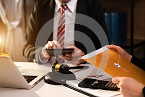 Lawyer businessman and two business partners working together in office.