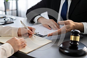 Lawyer colleagues or legal team working at law firm office desk. Equilibrium