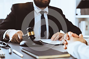 Lawyer colleagues or legal team working at law firm office desk. Equilibrium