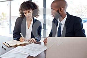 Lawyer, consultant and documents with a business team working on a desk in an office for growth. Contract, meeting or