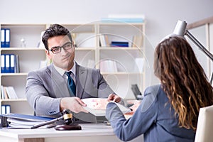 The lawyer discussing legal case with client