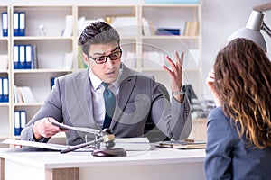 The lawyer discussing legal case with client