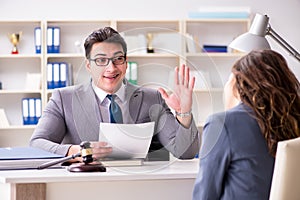 The lawyer discussing legal case with client