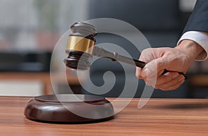 Lawyer holds gavel. Justice and Law concept