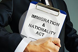 Lawyer holds Immigration and Nationality Act INA photo