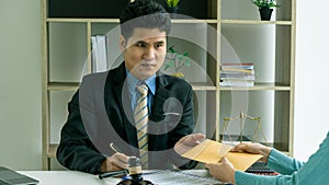 A lawyer or judge`s legal counsel in court makes fair and lawful decisions. Male lawyer working in the office. Law, advice and jus