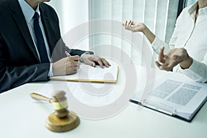 Lawyer are listening to reports from associates or clients in order