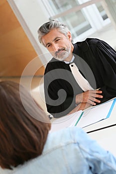 Lawyer meeting client in his office