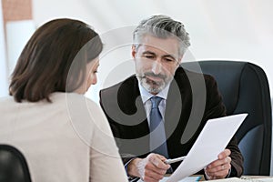 Lawyer meeting client in his office photo