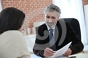 Lawyer meeting client in office