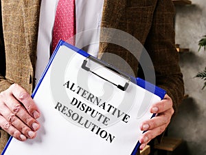 Lawyer offers documents alternative dispute resolution ADR. photo