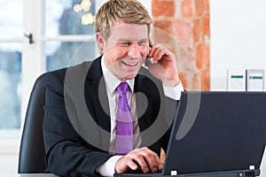 Lawyer in office sitting on the computer