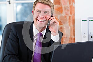 Lawyer in office sitting on the computer