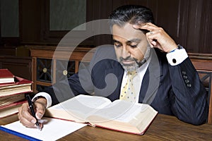 Lawyer Reading Law Book