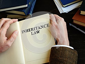 Lawyer reads Inheritance Law in the office