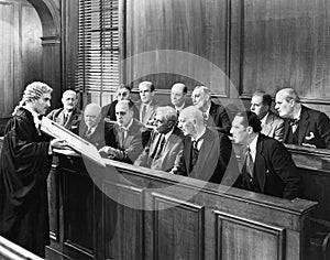 Lawyer showing evidence to the jury photo