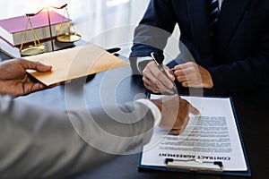Lawyer signs contract for bribery for document forgery Corrupt businessman gives bribe to help lawyer