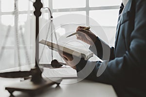 The lawyer sits in his private office, A reliable lawyer is sitting in a firm, The judge is studying information about future