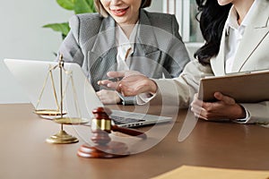 Lawyer working with client discussing contract document in office, consulting to help customer