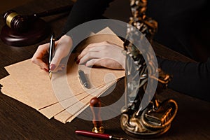 Lawyer working with contract papers and wooden gavel on tabel in courtroom. justice and law ,attorney, court judge,