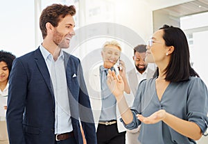 Lawyers, business people and talking in office, discussion or conversation. Attorney, corporate or happy man and Asian