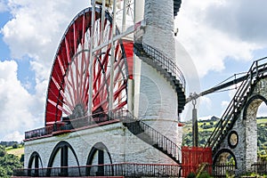 The Laxey Wheel also known as Lady Isabella is built into the hillside above the village of Laxey in the Isle of Man. It is the