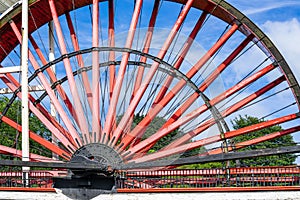 The Laxey Wheel also known as Lady Isabella is built into the hillside above the village of Laxey in the Isle of Man. It is the