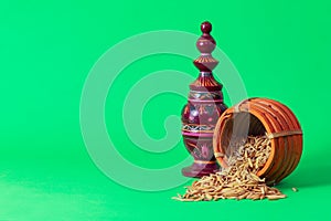 Laxmi puja essentials for rituals kept together. rice paddy grains and other objects symbolizing goddess of riches and prosperity