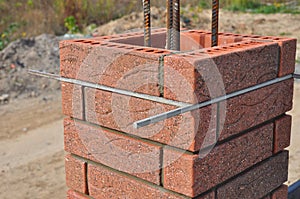 Lay bricks and blocks correctly. Closeup.