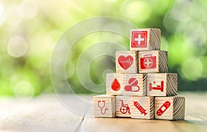 Lay out wooden blocks with icons of medical health. health insurance for your health concept